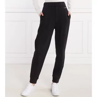 Calvin Klein Spodnie dresowe | Relaxed fit - Dresy damskie - miniaturka - grafika 1