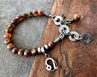 Bransoletki - Bransoletka ZODIAK z bursztynem - LEW - miniaturka - grafika 1