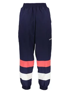 Spodnie sportowe męskie - Asics Spodnie dresowe w kolorze granatowym - grafika 1