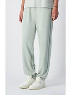 Spodnie sportowe damskie - Champion Spodnie dresowe w kolorze miętowym - miniaturka - grafika 1