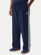 Spodnie sportowe męskie - adidas Spodnie dresowe adicolor Spacer Track KD4087 Granatowy Baggy Fit - miniaturka - grafika 1