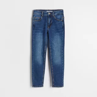Spodnie i spodenki dla chłopców - Reserved Elastyczne jeansy slim - Granatowy - grafika 1