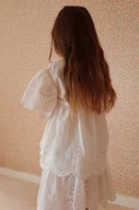 Bluzki dla dziewczynek - Konges Sløjd bluzka bawełniana dziecięca kolor biały gładka - miniaturka - grafika 1