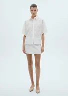 Spódnice - MANGO - Spódnica bawełniana z kwiatowym haftem biały - L - Kobieta - miniaturka - grafika 1