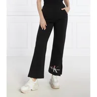 Dresy damskie - CALVIN KLEIN JEANS Spodnie dresowe DIFFUSED | flare fit - miniaturka - grafika 1