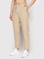 Spodnie sportowe damskie - Tommy Hilfiger Spodnie dresowe WW0WW33452 Beżowy Relaxed Fit - miniaturka - grafika 1