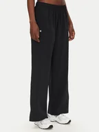 Spodnie sportowe damskie - Under Armour Spodnie dresowe Rival 1386453 Czarny Wide Leg - miniaturka - grafika 1