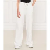 Spodnie sportowe damskie - GUESS ACTIVE Spodnie dresowe | Relaxed fit - miniaturka - grafika 1