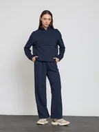 Spodnie sportowe damskie - BGN Spodnie dresowe w kolorze granatowym - miniaturka - grafika 1