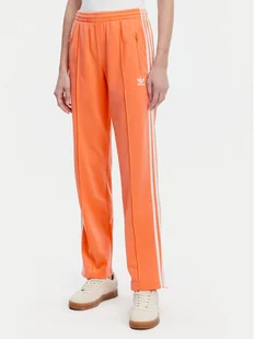 adidas Spodnie dresowe adicolor Classics Firebird JC8286 Pomarańczowy Regular Fit - Spodnie sportowe damskie - miniaturka - grafika 1