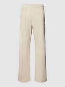 Spodnie sportowe męskie - Spodnie dresowe ze szwami inside out model ‘WYSO’ - miniaturka - grafika 1