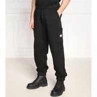 Dresy męskie - Tommy Jeans Spodnie dresowe BADGE | Regular Fit - miniaturka - grafika 1