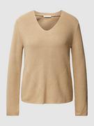 Swetry damskie - Sweter z dzianiny w jednolitym kolorze z dekoltem w serek - miniaturka - grafika 1