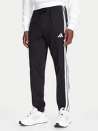 Spodnie sportowe męskie - adidas Spodnie dresowe Essentials 3-Stripes JE6430 Czarny Regular Fit - miniaturka - grafika 1