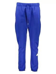 Spodnie sportowe damskie - adidas Spodnie dresowe w kolorze niebieskim - grafika 1