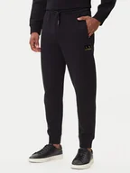 Spodnie sportowe męskie - Armani Exchange Spodnie dresowe XM001886 AF10818 MC004 Czarny Slim Fit - miniaturka - grafika 1