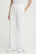 Spodnie damskie - Lacoste spodnie dresowe kolor biały gładkie - miniaturka - grafika 1