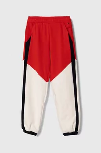 Spodnie i spodenki dla dziewczynek - Tommy Hilfiger spodnie dresowe dziecięce kolor czerwony wzorzyste - grafika 1