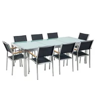 Meble ogrodowe - Beliani Stół szklany - do ogrodu - 220 cm - z 8 czarnymi krzesłami - GROSSETO - miniaturka - grafika 1