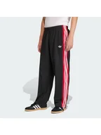 Spodnie sportowe męskie - adidas Spodnie dresowe KE0117 Czarny Loose Fit - miniaturka - grafika 1