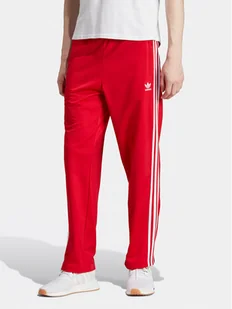 adidas Spodnie dresowe adicolor Classics Firebird IJ7057 Czerwony Regular Fit - Spodnie sportowe męskie - miniaturka - grafika 1