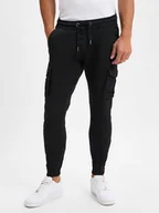 Spodnie męskie - Alpha Industries Spodnie Mężczyźni Bawełna czarny jednolity, S - miniaturka - grafika 1