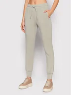 Spodnie sportowe damskie - Guess Spodnie dresowe V2RB02 KAMN2 Beżowy Regular Fit - miniaturka - grafika 1
