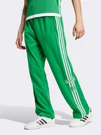 Spodnie sportowe męskie - adidas Spodnie dresowe w kolorze zielonym - miniaturka - grafika 1