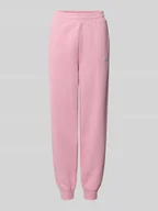 Spodnie sportowe damskie - Spodnie dresowe o kroju slim fit z wyhaftowanym logo - miniaturka - grafika 1