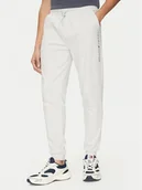 Spodnie sportowe męskie - Tommy Hilfiger Spodnie dresowe UM0UM03348 Beżowy Regular Fit - miniaturka - grafika 1