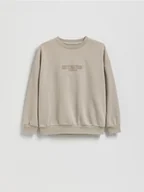 Kurtki i płaszcze dla chłopców - Reserved - Bluza z nadrukiem - beżowy - miniaturka - grafika 1