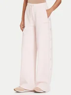 Spodnie sportowe damskie - Guess Spodnie dresowe V5BB12 KCX22 Różowy Wide Leg - miniaturka - grafika 1