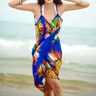 Sukienki - Sukienka plażowa w kwiatowy wzór - Niebieski Uniwersalny - miniaturka - grafika 1