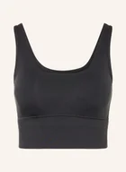 Biustonosze - Under Armour Krótki Top Meridian Fitted schwarz - miniaturka - grafika 1
