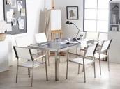 Stoły ogrodowe - Beliani Stół czarny palony ze stali nierdzewnej 180cm - kamienny blat - dzielo - miniaturka - grafika 1