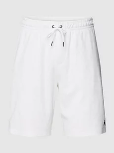 Szorty z dzianiny dresowej ze wzorem na całej powierzchni model ‘ATHLETIC’ - Spodnie sportowe męskie - miniaturka - grafika 1