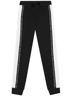 Spodnie i spodenki dla chłopców - Calvin Klein Jeans Spodnie dresowe Colour Block IB0IB00866 Czarny Regular Fit - grafika 1