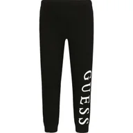 Spodnie sportowe damskie - Guess Legginsy | Slim Fit - miniaturka - grafika 1