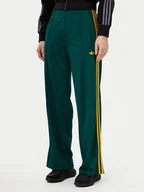 Spodnie sportowe damskie - adidas Spodnie dresowe adicolor Classic Firebird JP2314 Zielony Loose Fit - miniaturka - grafika 1