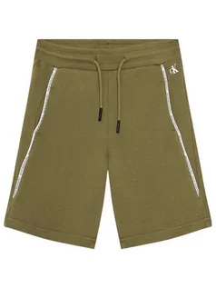 Spodnie i spodenki dla chłopców - Calvin Klein Jeans Szorty sportowe Logo Piping IB0IB00929 Zielony Regular Fit - grafika 1