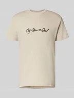 Koszulki męskie - T-shirt z nadrukiem z logo i okrągłym dekoltem - miniaturka - grafika 1