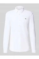 Koszule męskie - Koszula casualowa o kroju slim fit z fakturą - Lacoste - miniaturka - grafika 1