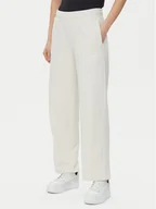 Spodnie sportowe damskie - Puma Spodnie dresowe Ess Small No. 1 Logo 684979 Beżowy Straight Fit - miniaturka - grafika 1