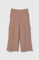 Spodnie i spodenki dla dziewczynek - United Colors of Benetton spodnie dresowe bawełniane dziecięce kolor beżowy gładkie - miniaturka - grafika 1