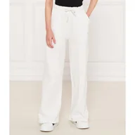 Spodnie sportowe damskie - GUESS ACTIVE Spodnie dresowe Relaxed fit - miniaturka - grafika 1