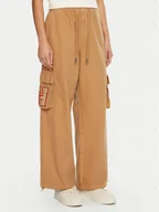 Spodnie damskie - Tommy Jeans Spodnie materiałowe DW0DW20531 Beżowy Relaxed Fit - miniaturka - grafika 1