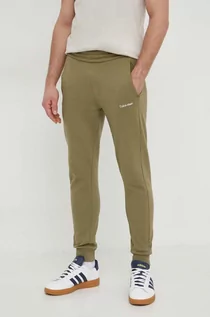 Spodnie męskie - Calvin Klein spodnie dresowe kolor zielony gładkie - grafika 1