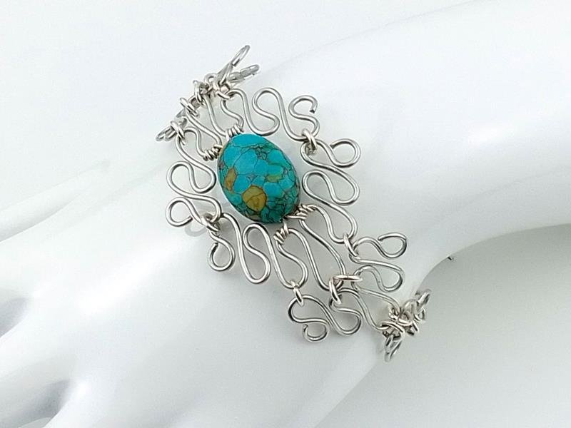 Bransoletka posrebrzana, turkus rekonstruowany, znak Skorpiona, obwód 16 - 21 cm