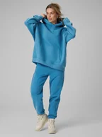 Spodnie sportowe damskie - 4F Spodnie dresowe joggery damskie - niebieskie XXL - miniaturka - grafika 1