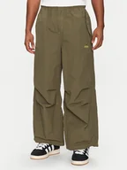 Spodnie sportowe męskie - adidas Spodnie dresowe Parachute JD5416 Zielony Loose Fit - miniaturka - grafika 1